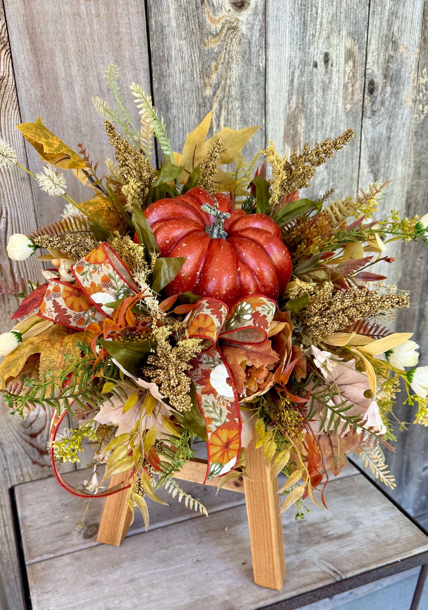Fall floral pumpkin arrangement