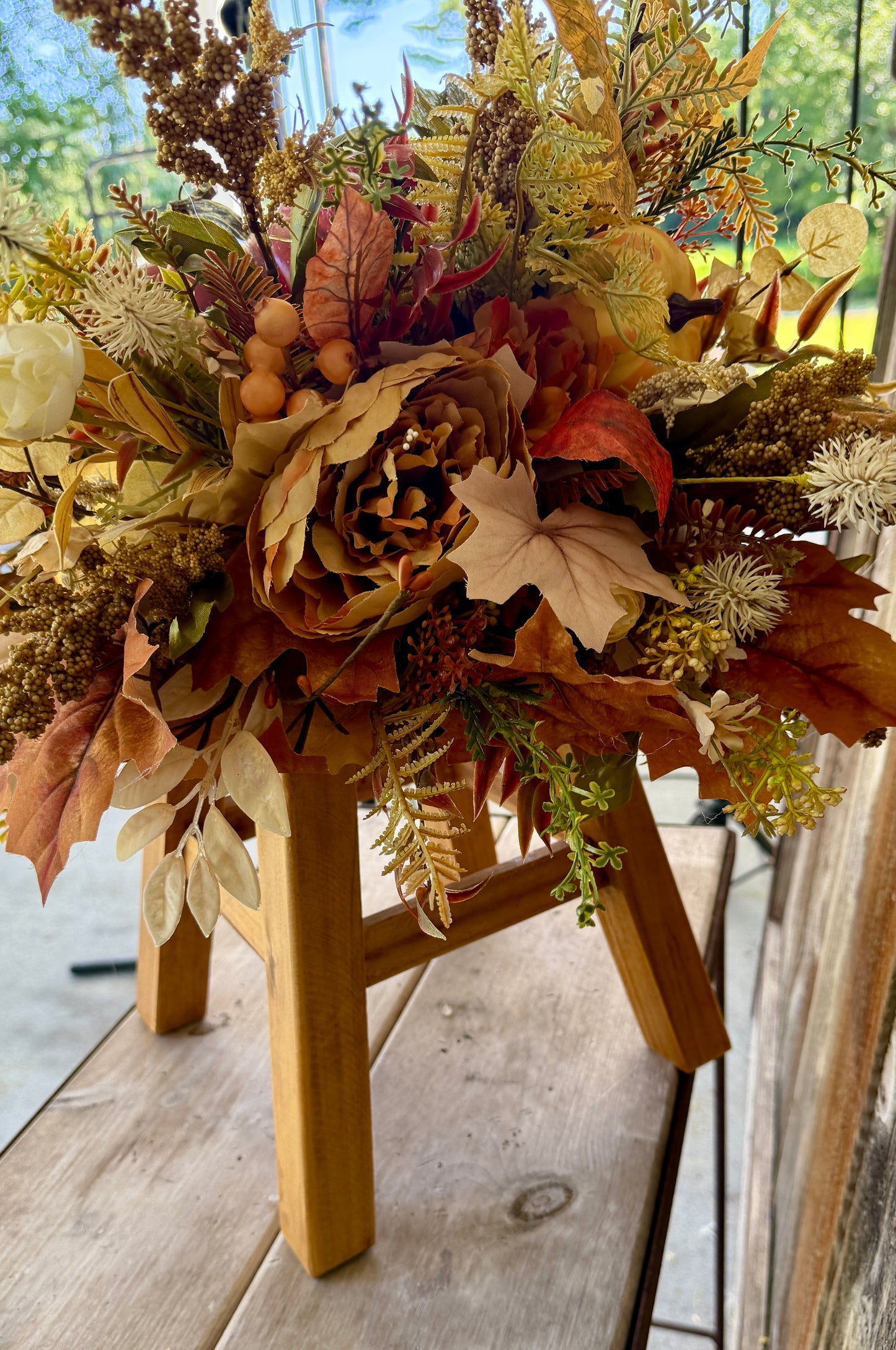 Fall floral pumpkin arrangement